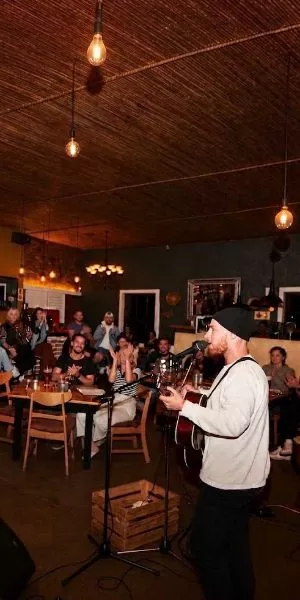 Open Mic with 20 percent off Pastas and Pizzas